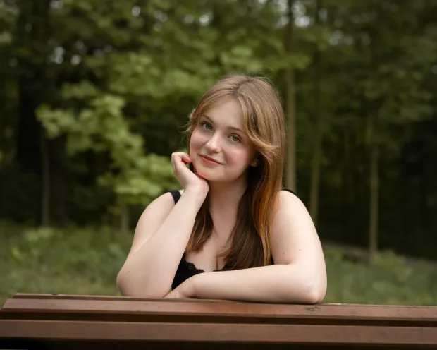 Smiling female portrait in a park