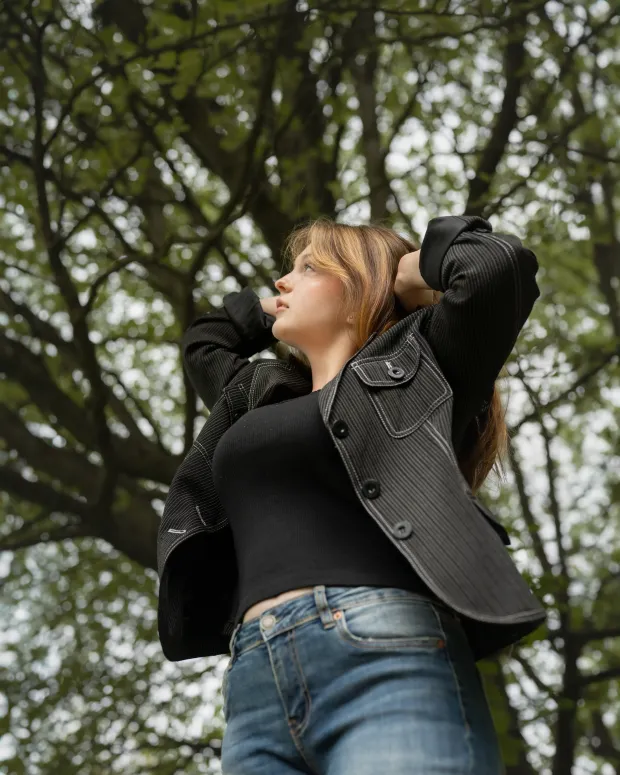 Female portrait under a tree canopy